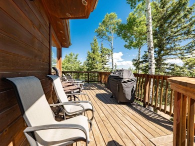 Tucked away amid whispering pines and just a short walk to the on Angel Fire Resort Country Club in New Mexico - for sale on GolfHomes.com, golf home, golf lot