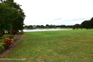 Escape the cold and enjoy yearround Florida sunshine in this on Glen Lakes Country Club in Florida - for sale on GolfHomes.com, golf home, golf lot
