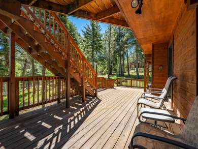 Tucked away amid whispering pines and just a short walk to the on Angel Fire Resort Country Club in New Mexico - for sale on GolfHomes.com, golf home, golf lot