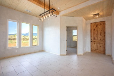 Have you ever desired to reside near a golf course, but avoided on Taos Country Club in New Mexico - for sale on GolfHomes.com, golf home, golf lot