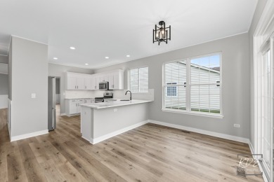 Gorgeous remodeled 2 bedroom & 2 bathroom Ranch home in Carillon on Carillon Lakes 3 Hole Course in Illinois - for sale on GolfHomes.com, golf home, golf lot