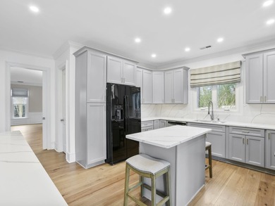 Experience country club living at its finest in this stunning on The Carolina Country Club in South Carolina - for sale on GolfHomes.com, golf home, golf lot