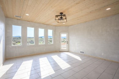 Have you ever desired to reside near a golf course, but avoided on Taos Country Club in New Mexico - for sale on GolfHomes.com, golf home, golf lot