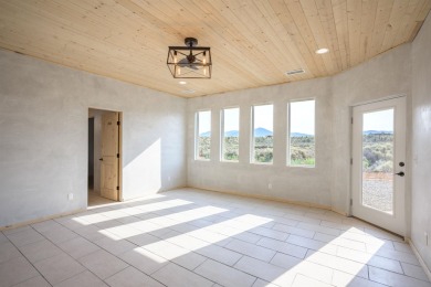 Have you ever desired to reside near a golf course, but avoided on Taos Country Club in New Mexico - for sale on GolfHomes.com, golf home, golf lot