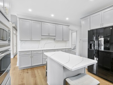 Experience country club living at its finest in this stunning on The Carolina Country Club in South Carolina - for sale on GolfHomes.com, golf home, golf lot