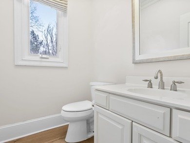 Experience country club living at its finest in this stunning on The Carolina Country Club in South Carolina - for sale on GolfHomes.com, golf home, golf lot