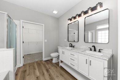 Gorgeous remodeled 2 bedroom & 2 bathroom Ranch home in Carillon on Carillon Lakes 3 Hole Course in Illinois - for sale on GolfHomes.com, golf home, golf lot