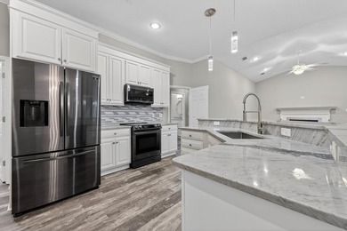 PRICE REDUCED $15,000 AND BIG FLOORING ALLOWANCE TOO!! Located on Emerald Bay Golf Club in Florida - for sale on GolfHomes.com, golf home, golf lot