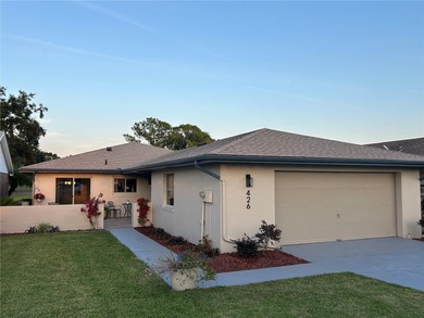 Located on a cul-de-sac, this 2 bedroom home overlooks a on Cypresswood Golf and Country Club in Florida - for sale on GolfHomes.com, golf home, golf lot