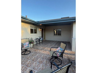 Located on a cul-de-sac, this 2 bedroom home overlooks a on Cypresswood Golf and Country Club in Florida - for sale on GolfHomes.com, golf home, golf lot