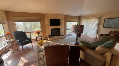 Sit back on your deck, high in the trees overlooking the golf on Yosemite Lakes Park Golf Course in California - for sale on GolfHomes.com, golf home, golf lot