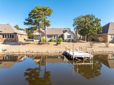 Welcome to 34 Linares Ln, a charming lakeside retreat in Hot on Isabella Golf Course  in Arkansas - for sale on GolfHomes.com, golf home, golf lot