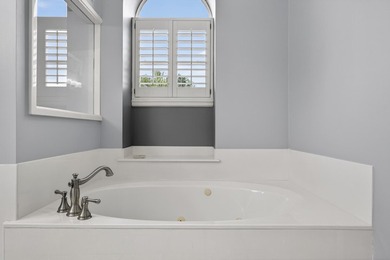 PRICE REDUCED $15,000 AND BIG FLOORING ALLOWANCE TOO!! Located on Emerald Bay Golf Club in Florida - for sale on GolfHomes.com, golf home, golf lot