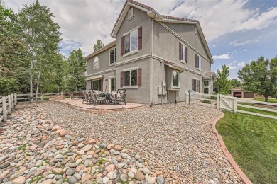 This large home has plenty of space for everyone. Upon entering on The Broadlands Golf Course in Colorado - for sale on GolfHomes.com, golf home, golf lot