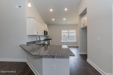 Discover the charm of the 1830 floor plan by Adams Homes on River Landing Golf Course in North Carolina - for sale on GolfHomes.com, golf home, golf lot