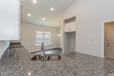 Discover the charm of the 1830 floor plan by Adams Homes on River Landing Golf Course in North Carolina - for sale on GolfHomes.com, golf home, golf lot