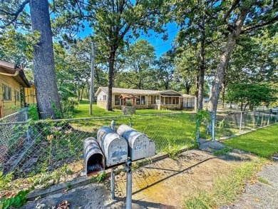 Welcome to lake life in Taylor Ferry! This super quiet on Sequoyah State Park Golf Course in Oklahoma - for sale on GolfHomes.com, golf home, golf lot