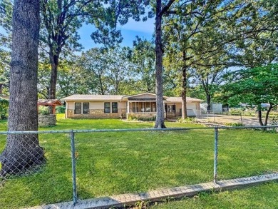 Welcome to lake life in Taylor Ferry! This super quiet on Sequoyah State Park Golf Course in Oklahoma - for sale on GolfHomes.com, golf home, golf lot