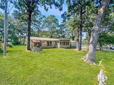 Welcome to lake life in Taylor Ferry! This super quiet on Sequoyah State Park Golf Course in Oklahoma - for sale on GolfHomes.com, golf home, golf lot