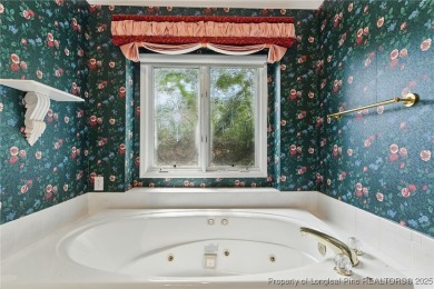 Seller offering $8,000 toward buyer's closing costs with an on Baywood Golf Club in North Carolina - for sale on GolfHomes.com, golf home, golf lot