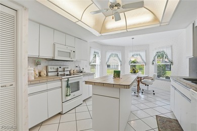 From the moment you step inside, cathedral ceilings fill the on Sabal Springs Golf and Racquet Club in Florida - for sale on GolfHomes.com, golf home, golf lot