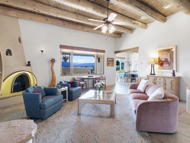 This exceptional adobe-style home, with a stucco exterior and on Taos Country Club in New Mexico - for sale on GolfHomes.com, golf home, golf lot