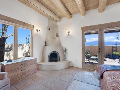 This exceptional adobe-style home, with a stucco exterior and on Taos Country Club in New Mexico - for sale on GolfHomes.com, golf home, golf lot