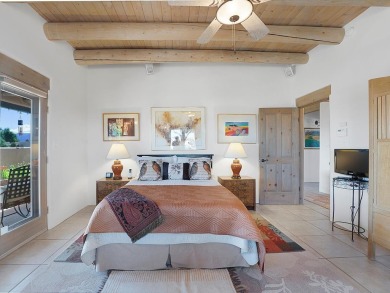 This exceptional adobe-style home, with a stucco exterior and on Taos Country Club in New Mexico - for sale on GolfHomes.com, golf home, golf lot