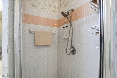 From the moment you step inside, cathedral ceilings fill the on Sabal Springs Golf and Racquet Club in Florida - for sale on GolfHomes.com, golf home, golf lot