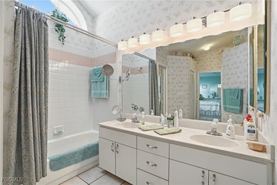 From the moment you step inside, cathedral ceilings fill the on Sabal Springs Golf and Racquet Club in Florida - for sale on GolfHomes.com, golf home, golf lot