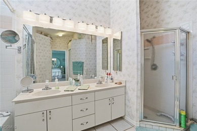 From the moment you step inside, cathedral ceilings fill the on Sabal Springs Golf and Racquet Club in Florida - for sale on GolfHomes.com, golf home, golf lot