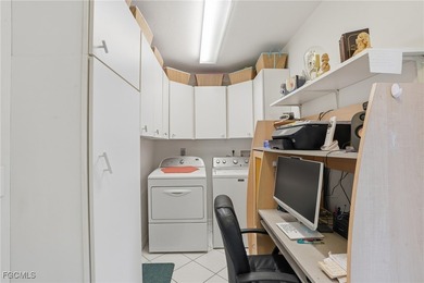 From the moment you step inside, cathedral ceilings fill the on Sabal Springs Golf and Racquet Club in Florida - for sale on GolfHomes.com, golf home, golf lot