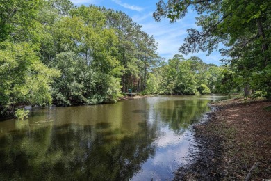 This wonderful waterfront 2-bedroom, 2-bath home blends comfort on Eagle Nest Golf Club in South Carolina - for sale on GolfHomes.com, golf home, golf lot