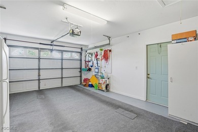 From the moment you step inside, cathedral ceilings fill the on Sabal Springs Golf and Racquet Club in Florida - for sale on GolfHomes.com, golf home, golf lot