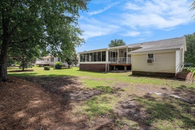 This wonderful waterfront 2-bedroom, 2-bath home blends comfort on Eagle Nest Golf Club in South Carolina - for sale on GolfHomes.com, golf home, golf lot