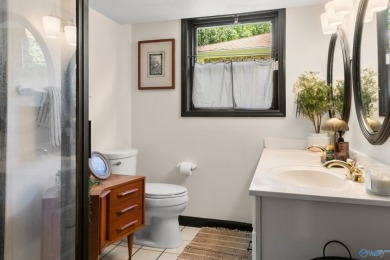 Don't miss this beautifully updated Mid-Century Modern gem just on Valley Hill Country Club in Alabama - for sale on GolfHomes.com, golf home, golf lot