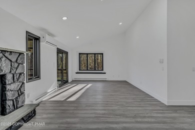 Welcome to this beautifully finished European modern ranch in on Pocono Farms Country Club in Pennsylvania - for sale on GolfHomes.com, golf home, golf lot