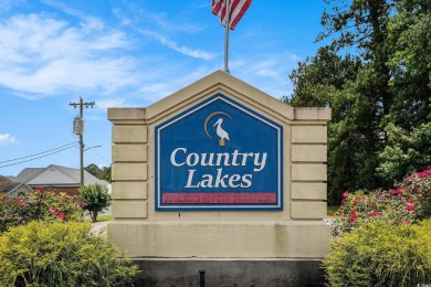 This wonderful waterfront 2-bedroom, 2-bath home blends comfort on Eagle Nest Golf Club in South Carolina - for sale on GolfHomes.com, golf home, golf lot
