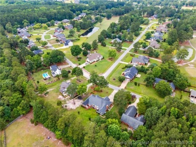 Seller offering $8,000 toward buyer's closing costs with an on Baywood Golf Club in North Carolina - for sale on GolfHomes.com, golf home, golf lot