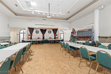 From the moment you step inside, cathedral ceilings fill the on Sabal Springs Golf and Racquet Club in Florida - for sale on GolfHomes.com, golf home, golf lot