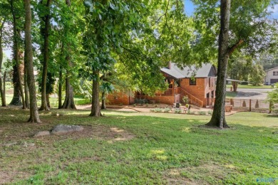 Don't miss this beautifully updated Mid-Century Modern gem just on Valley Hill Country Club in Alabama - for sale on GolfHomes.com, golf home, golf lot