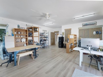 This exceptional adobe-style home, with a stucco exterior and on Taos Country Club in New Mexico - for sale on GolfHomes.com, golf home, golf lot