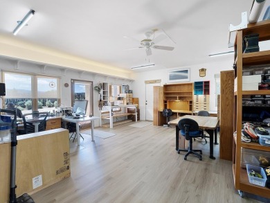 This exceptional adobe-style home, with a stucco exterior and on Taos Country Club in New Mexico - for sale on GolfHomes.com, golf home, golf lot