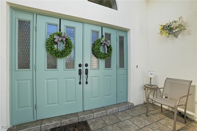 From the moment you step inside, cathedral ceilings fill the on Sabal Springs Golf and Racquet Club in Florida - for sale on GolfHomes.com, golf home, golf lot