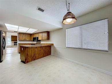 Welcome to this beautifully updated home in the highly on Northdale Golf and Tennis Club in Florida - for sale on GolfHomes.com, golf home, golf lot