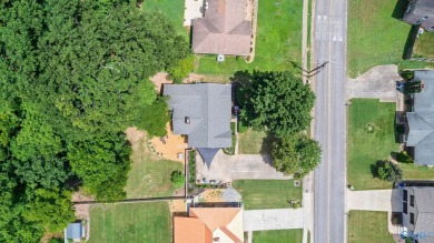 Don't miss this beautifully updated Mid-Century Modern gem just on Valley Hill Country Club in Alabama - for sale on GolfHomes.com, golf home, golf lot