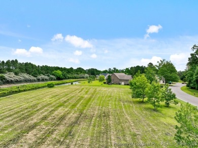 Nestled near the picturesque coast of Eastern NC, this .44-acre on River Landing Golf Course in North Carolina - for sale on GolfHomes.com, golf home, golf lot