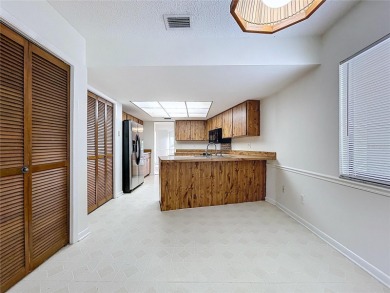 Welcome to this beautifully updated home in the highly on Northdale Golf and Tennis Club in Florida - for sale on GolfHomes.com, golf home, golf lot