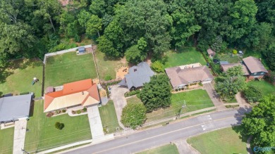 Don't miss this beautifully updated Mid-Century Modern gem just on Valley Hill Country Club in Alabama - for sale on GolfHomes.com, golf home, golf lot