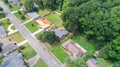Don't miss this beautifully updated Mid-Century Modern gem just on Valley Hill Country Club in Alabama - for sale on GolfHomes.com, golf home, golf lot